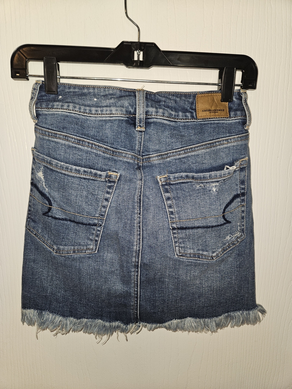 American Eagle Outfitters Dark Blue Denim Mini Skirt with Light Pink Embroidery - Picture 5 of 8